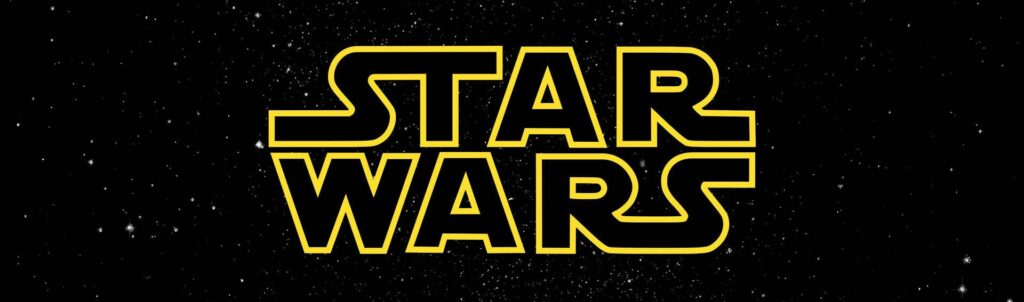 STAR WARS in late 1970s sci-fi font, the letters transparent but outlined in yellow. In the background, a starscape.